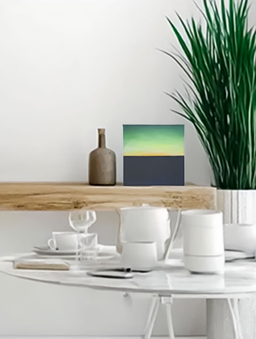 Horizon painting on a styled shelf